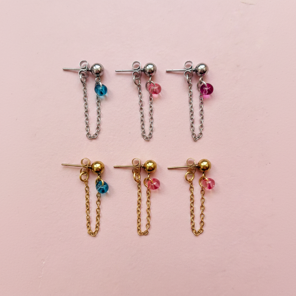Boucles fond rose poudré