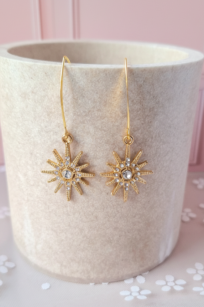Boucles étoile dorée - fond rose poudré