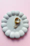 Collier soleil fond rose poudré