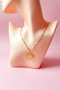 Collier étoile 2 fond rose poudré